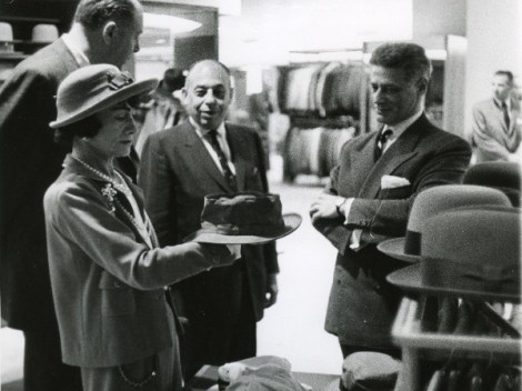 Designer Coco Chanel, left, and touring luxury retailer Neiman Marcus during a visit to Dallas. Neiman Marcus leader, Stanley Marcus is third from left. Sept. 1957. (AP Photo/DeGolyer Library, Southern Methodist University) 