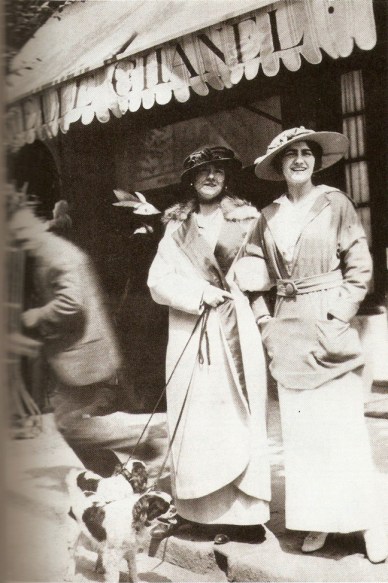 Coco Chanel and her aunt Adrienne in front of her boutique in Deauville, 1913. Image from “Chanel, A Woman Of Her Own” by Axel Madsen.